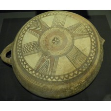 Bowl of bichrome ware, six-pointed solar disc, sun disc